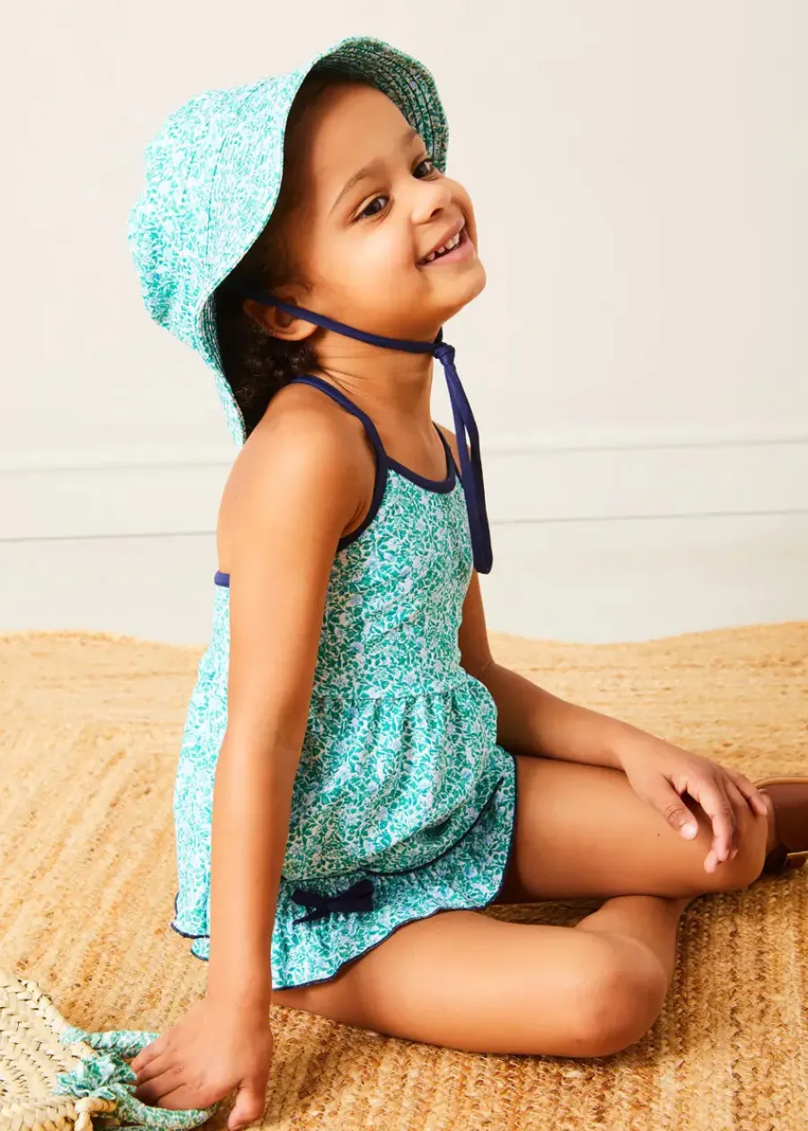 Pepa London Adelaide Floral Bow Detail Two Piece Swimsuit in Green (2-10yrs) | Adelaide Floral Beach Hat in Green (S-M) | Adelaide Floral Detail Raffia Bag in Green | Leather Buckle Detail Sandals in Camel (24-34EU)