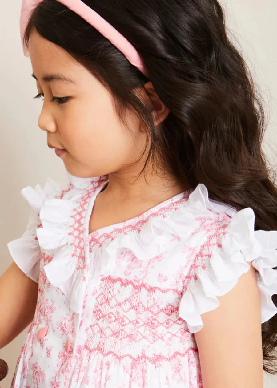 Pepa London Audrey Toile Hand Smocked Double Breasted Sleeveless Dress in Pink (12mths-10yrs) | Peter Pan Collar Swing Coat in Pink (18mths-10yrs) | Openwork Cotton Cardigan in Cream (6mths-10yrs) | Leather Mary Jane Shoes in Pink (24-34EU) | Traditional Big Bow Tulle Hairband in Dusty Pink | Openwork short socks White (0mths-8yrs)