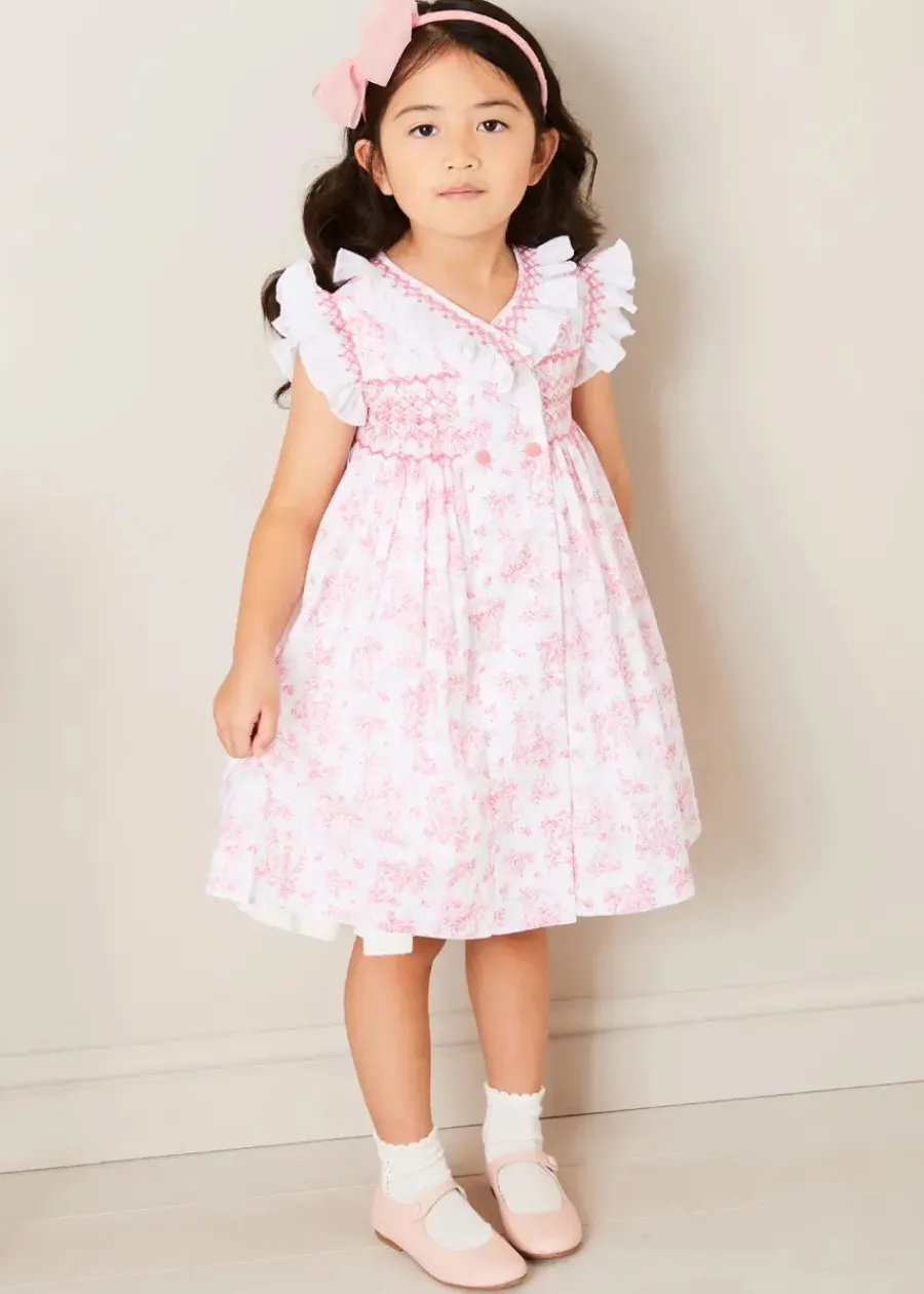 Pepa London Audrey Toile Hand Smocked Double Breasted Sleeveless Dress in Pink (12mths-10yrs) | Peter Pan Collar Swing Coat in Pink (18mths-10yrs) | Openwork Cotton Cardigan in Cream (6mths-10yrs) | Leather Mary Jane Shoes in Pink (24-34EU) | Traditional Big Bow Tulle Hairband in Dusty Pink | Openwork short socks White (0mths-8yrs)