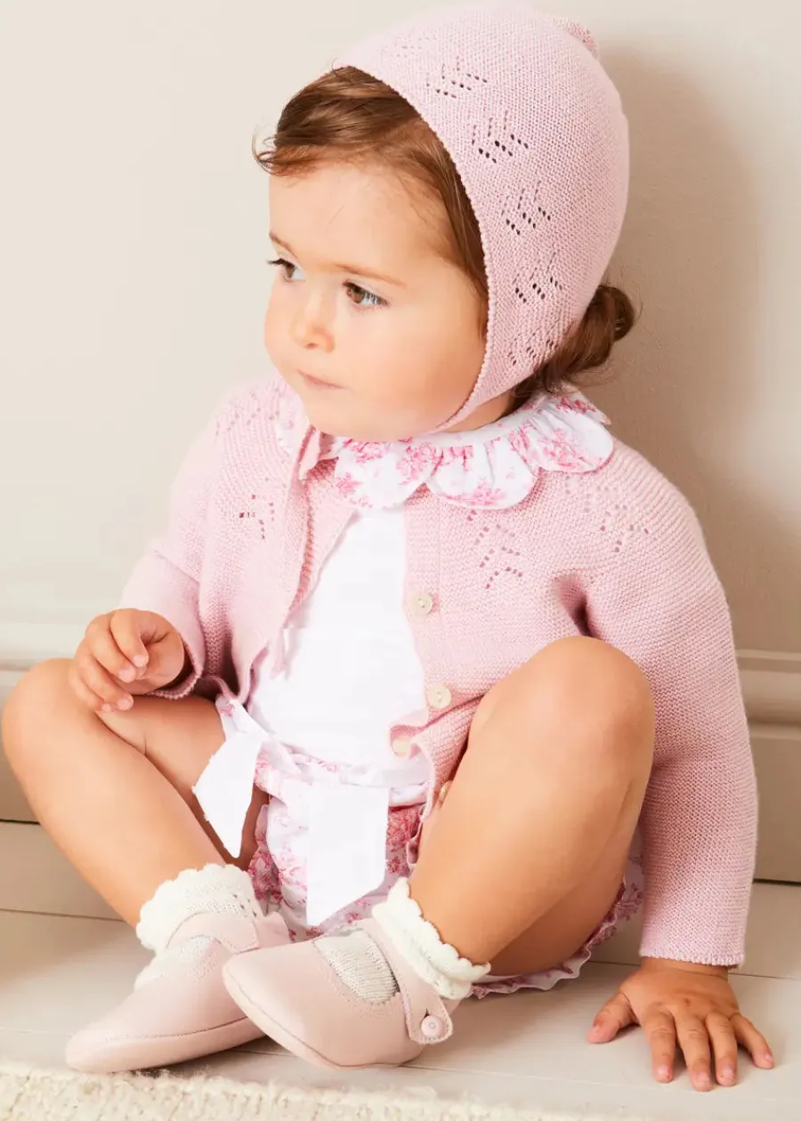 Pepa London Audrey Toile Scallop Collar Short Sleeve Bodysuit in Pink (1mth-2yrs) | Audrey Toile Bow Detail Bloomers in Pink (1mth-2yrs) | Openwork Cotton Cardigan in Pink (6mths-10yrs) | Openwork Cotton Knitted Bonnet in Pink (S-L) | Mary Jane Pram Shoes in Pink (17-20EU) | Audrey Toile Dummy Clip in Pink | Openwork short socks White (0mths-8yrs) | BIBS Dummy in Pink