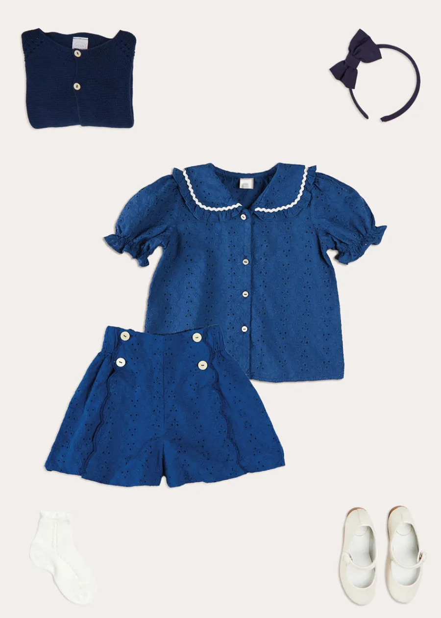 Pepa London Broderie Anglaise Statement Collar Short Sleeve Blouse in Blue (4-12yrs) | Broderie Anglais Button Detail Shorts in Blue (4-12yrs) | Plain Cardigan in Navy (6mths-10yrs) | Openwork short socks White (0mths-8yrs) | Navy Linen Big Bow Hairband
