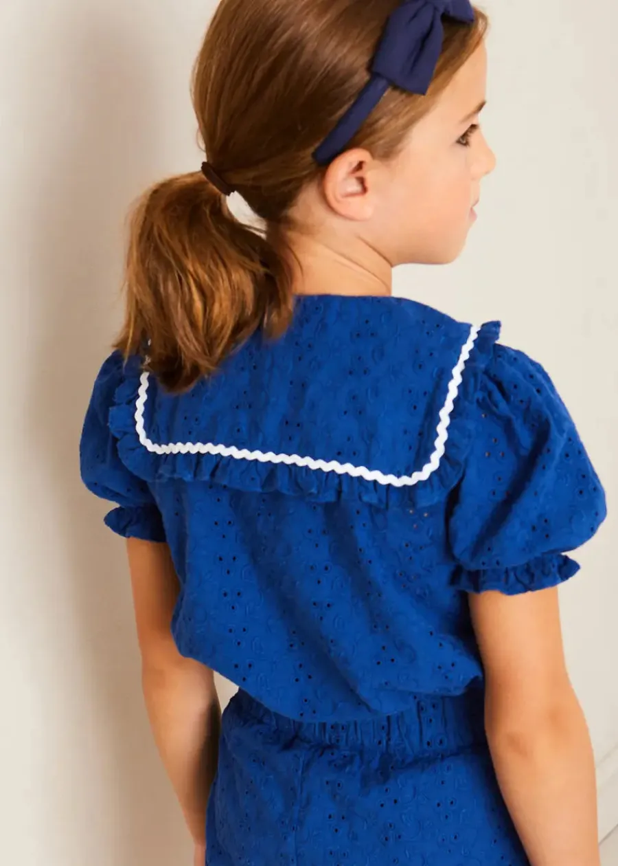 Pepa London Broderie Anglaise Statement Collar Short Sleeve Blouse in Blue (4-12yrs) | Broderie Anglais Button Detail Shorts in Blue (4-12yrs) | Plain Cardigan in Navy (6mths-10yrs) | Openwork short socks White (0mths-8yrs) | Navy Linen Big Bow Hairband