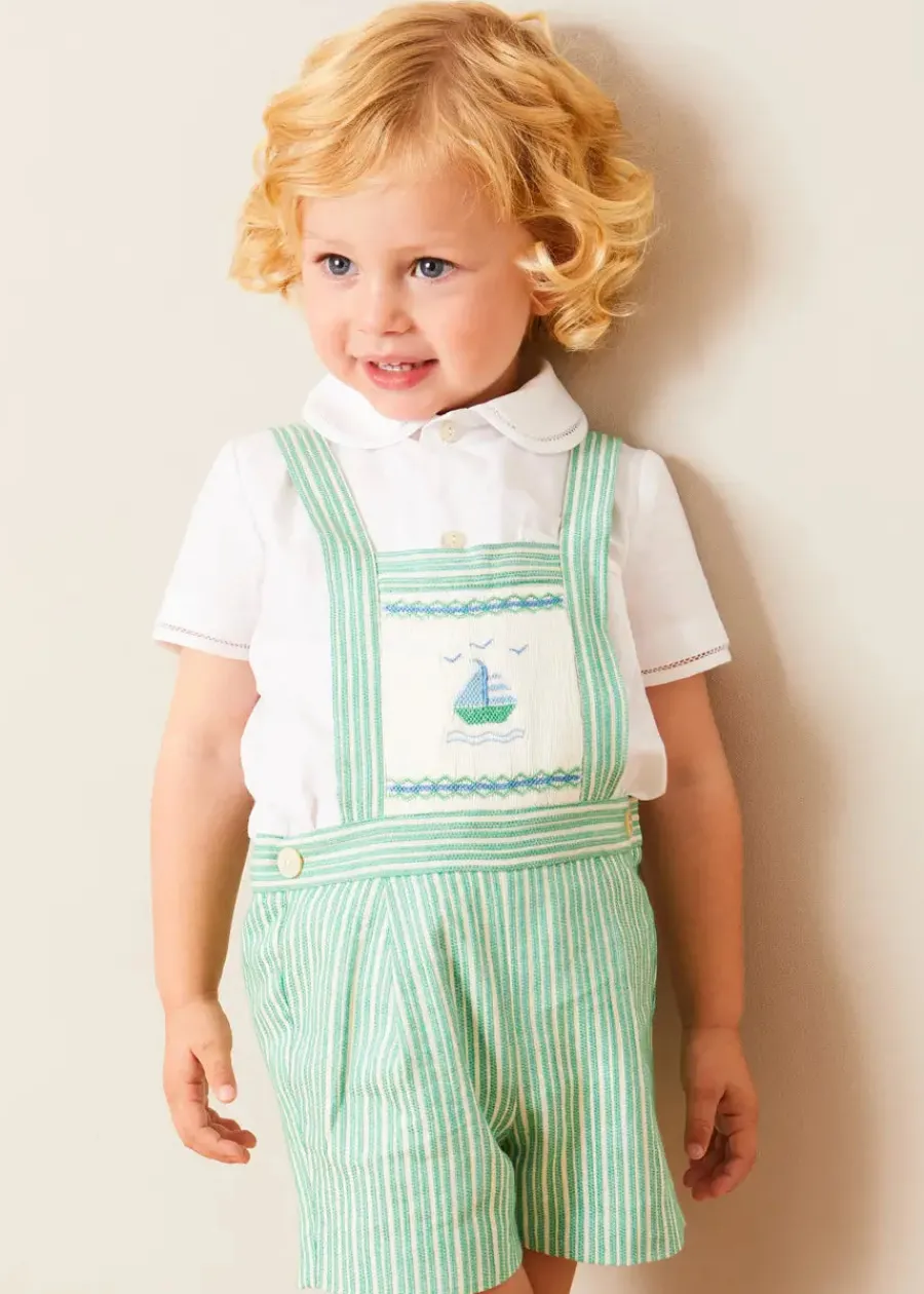 BOY Pepa London Cheyne Striped Boat Embroidery Dungarees in Green (18mths-4yrs) | Peter Pan Collar Trim Detail Short Sleeve Shirt in White (12mths-5yrs) | Plain Cardigan in Cream (6mths-10yrs) | T-Bar Suede Baby Shoes in Beige (20-24EU) | Ribbed Short Socks in Beige (0mths-10yrs)
