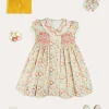 Pepa London Clementine Floral Hand Smocked Double Breasted Short Sleeve Dress in Coral (12mths-10yrs) | Mary Jane Leather Baby Shoes in Ivory (20-24EU) | Clementine Floral Long Bow Hair Clip in Coral | Openwork short socks White (0mths-8yrs)