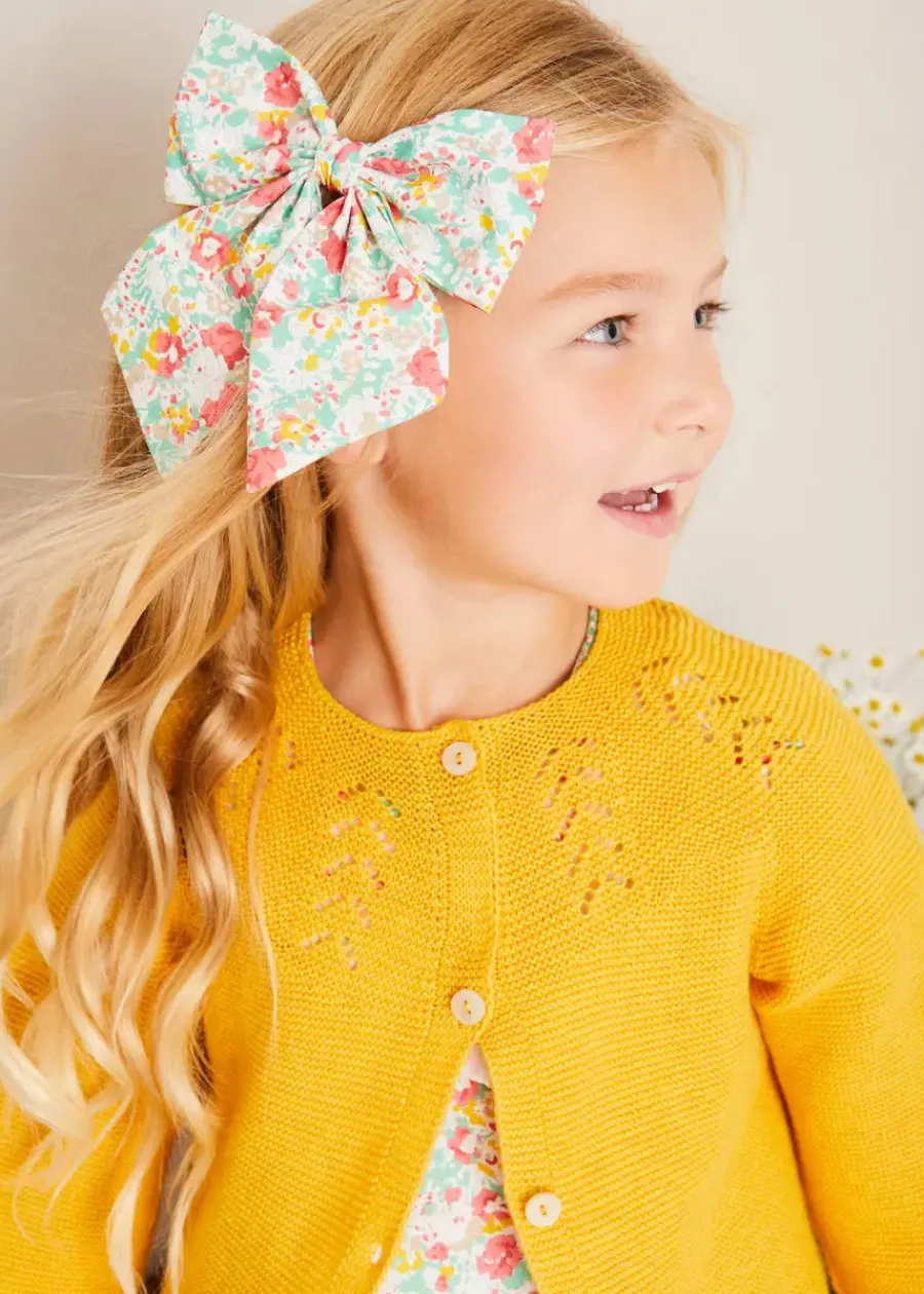 Pepa London Clementine Floral Hand Smocked Double Breasted Short Sleeve Dress in Coral (12mths-10yrs) | Mary Jane Leather Baby Shoes in Ivory (20-24EU) | Clementine Floral Long Bow Hair Clip in Coral | Openwork short socks White (0mths-8yrs)