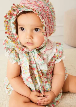 Pepa London Clementine Floral Hand Smocked Double Breasted Short Sleeve Romper in Coral (6mths-3yrs)