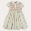 Pepa London Cordelia Floral Hand-Smocked Short Sleeve Dress in Pink Made with Liberty Fabric (12m-6yrs)