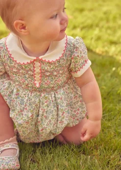 Pepa London Cordelia Floral Hand-Smocked Short Sleeve Romper in Pink Made with Liberty Fabric (3m-2yrs)