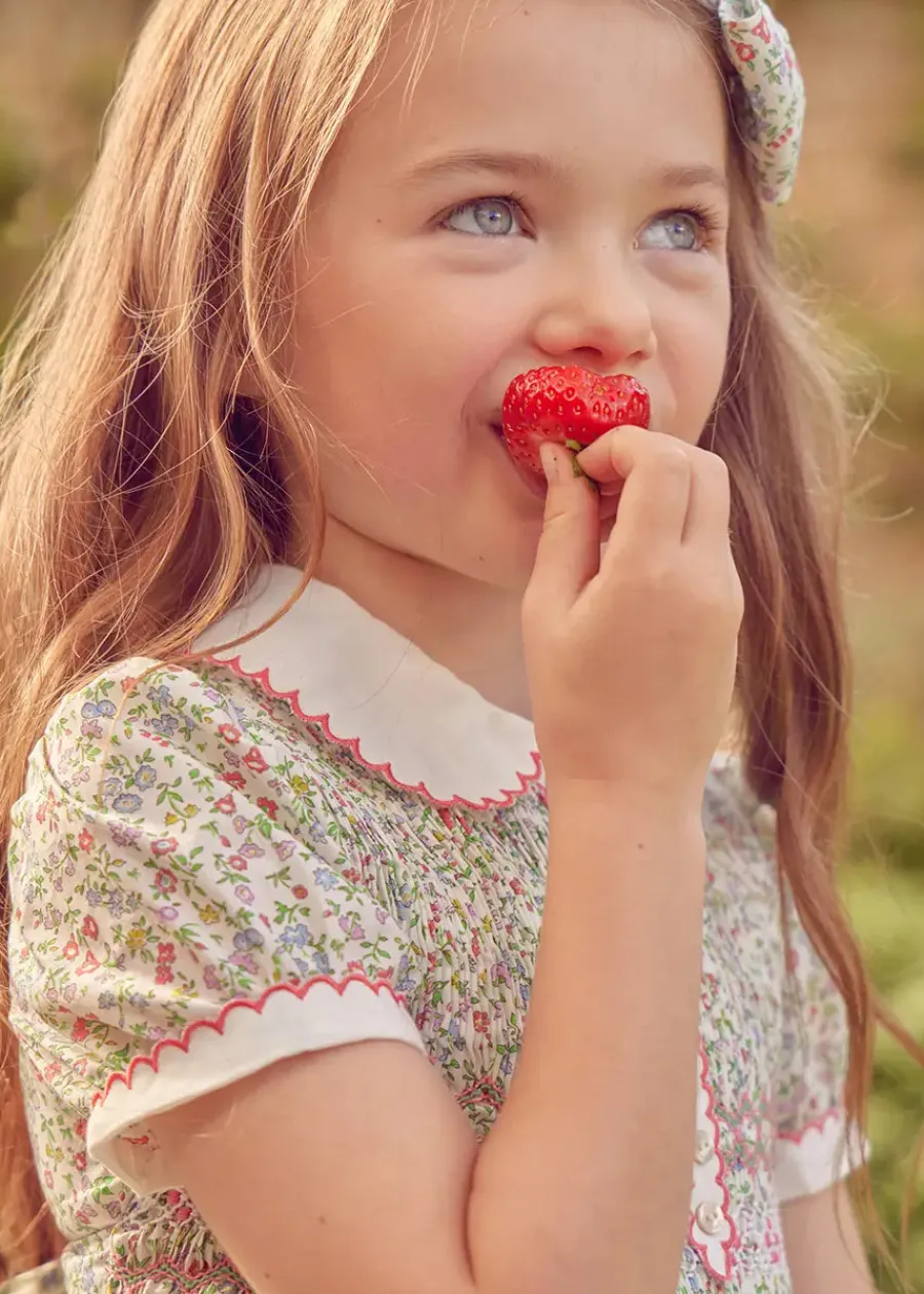 Pepa London Cordelia Floral Hand-Smocked Short Sleeve Dress in Pink Made with Liberty Fabric (12m-6yrs)