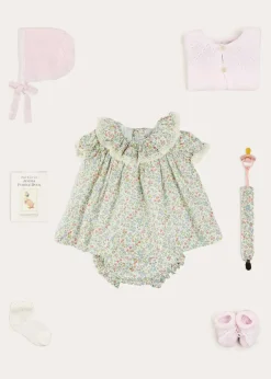 Pepa London Cordelia Floral Ruffle Collar Short Sleeve Dress in Green Made with Liberty Fabric (1-12m) | Openwork Detail Baby Cardigan in Pink (1-12mths) | Lace Detail Knitted Bonnet in Pink (1-12mths) | Lace Detail Knitted Booties in Pink | Cordelia Liberty Floral Dummy Clip in Pink | Openwork short socks White (0mths-8yrs) | BIBS Dummy in Pink