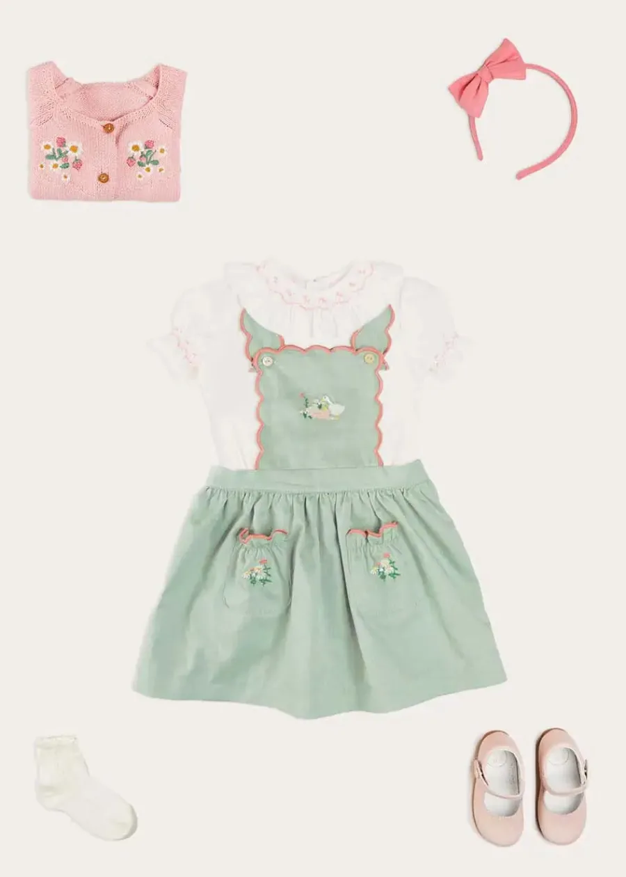 Pepa London Duck Embroidered Scallop Detail Skirt With Braces in Green (18mths-6yrs) | Hand Smocked Collar Short Sleeve Blouse in White (18mths-6yrs) | Strawberry Embroidery Cardigan in Pink (12mths-6yrs) | Mary Jane Baby Shoes in Pink (20-26EU) | Raspberry Linen Hairband