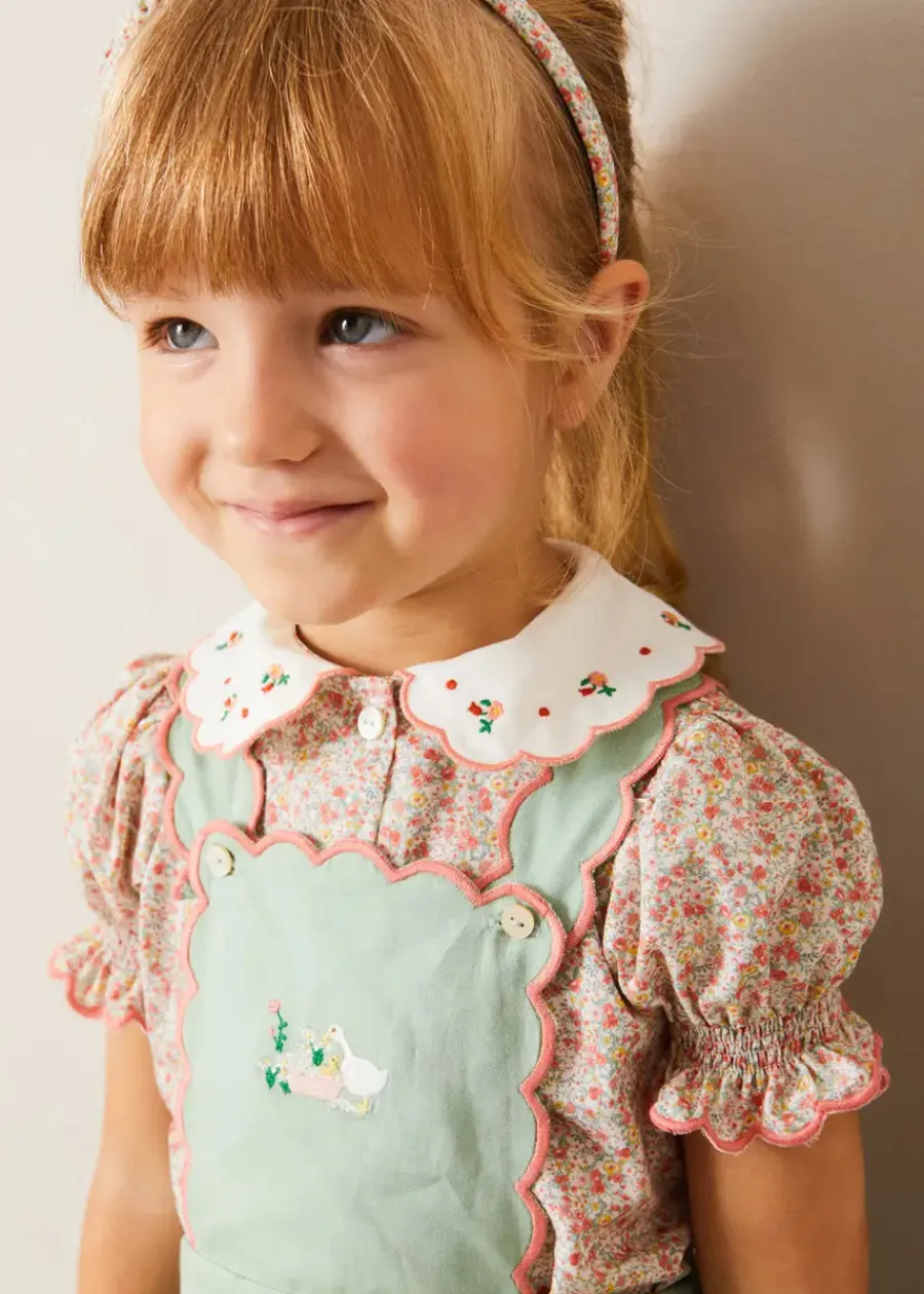 Pepa London Duck Embroidered Scallop Detail Skirt With Braces in Green (18mths-6yrs) | Mabel Floral Embroidered Short Sleeve Blouse in Coral (18mths-10yrs) | Floral Openwork Cotton Cardigan in Pink (2-10yrs) | Mary Jane Leather Baby Shoes in Ivory (20-24EU) | Mabel Floral Hairband in Coral | Openwork short socks - Dusty Pink (0mths-10yrs)