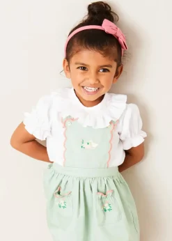 Pepa London Duck Embroidered Scallop Detail Skirt With Braces in Green (18mths-6yrs) | Hand Smocked Collar Short Sleeve Blouse in White (18mths-6yrs) | Strawberry Embroidery Cardigan in Pink (12mths-6yrs) | Mary Jane Baby Shoes in Pink (20-26EU) | Raspberry Linen Hairband