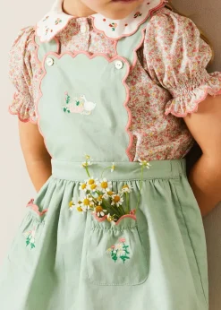 Pepa London Duck Embroidered Scallop Detail Skirt With Braces in Green (18mths-6yrs) | Mabel Floral Embroidered Short Sleeve Blouse in Coral (18mths-10yrs) | Floral Openwork Cotton Cardigan in Pink (2-10yrs) | Mary Jane Leather Baby Shoes in Ivory (20-24EU) | Mabel Floral Hairband in Coral | Openwork short socks - Dusty Pink (0mths-10yrs)