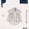 BOY Pepa London Ellis Liberty Print Hand Smocked Short Sleeve Shirt in Blue (6mths-4yrs) | Ellis Floral Bloomer in Blue Made with Liberty Fabric (1m-3yrs) | Plain Cardigan in Navy (6mths-10yrs) | Openwork Knitted Bonnet in Navy (S-L) | Leather T-Bar Pram Shoes in Classic Blue (17-20EU) | Ribbed Short Socks - Cream (0mths-10yrs)