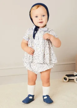 BOY Pepa London Ellis Liberty Print Hand Smocked Short Sleeve Shirt in Blue (6mths-4yrs) | Ellis Floral Bloomer in Blue Made with Liberty Fabric (1m-3yrs) | Plain Cardigan in Navy (6mths-10yrs) | Openwork Knitted Bonnet in Navy (S-L) | Leather T-Bar Pram Shoes in Classic Blue (17-20EU) | Ribbed Short Socks - Cream (0mths-10yrs)