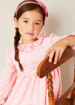 Pepa London Gingham Smocked Ruffle Collar Long Sleeve Dress in Coral (12mths-10yrs) | Floral Openwork Cotton Cardigan in Pink (2-10yrs) | Girls Ivory Leather Mary Jane Shoes (20-34EU) | Raspberry Linen Hairband | Openwork short socks White (0mths-8yrs)