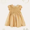 Pepa London Hand Smocked Peter Pan Collar Short Sleeve Dress in Beige (12mths-10yrs) | Openwork Cotton Cardigan in Cream (6mths-10yrs) | Girls Ivory Leather Mary Jane Shoes (20-34EU) | Traditional Big Bow Tulle Hairband in Ivory | Celebration Short Socks with Ruffle- Cream (0mths-10yrs) | Tulle Long Bow Clip In Cream