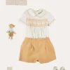 BOY Pepa London Hand Smocked Peter Pan Collar Short Sleeve Two Piece Set in Beige (18mths-6yrs) | Plain Cardigan in Cream (6mths-10yrs) | T-Bar Leather Baby Shoes in Ivory (20-24EU) | Cotton Short Socks Cream (0mths-10yrs)