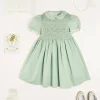 Pepa London Hand Smocked Peter Pan Collar Short Sleeve Dress in Green (12mths-10yrs) | Openwork Cotton Cardigan in Cream (6mths-10yrs) | Girls Ivory Leather Mary Jane Shoes (20-34EU) | Traditional Big Bow Tulle Hairband in Ivory | Flower Fairies of the Spring Book in White | Openwork short socks White (0mths-8yrs)