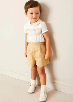 BOY Pepa London Hand Smocked Peter Pan Collar Short Sleeve Two Piece Set in Beige (18mths-6yrs) | Plain Cardigan in Cream (6mths-10yrs) | T-Bar Leather Baby Shoes in Ivory (20-24EU) | Cotton Short Socks Cream (0mths-10yrs)