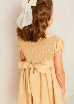 Pepa London Hand Smocked Peter Pan Collar Short Sleeve Dress in Beige (12mths-10yrs) | Openwork Cotton Cardigan in Cream (6mths-10yrs) | Girls Ivory Leather Mary Jane Shoes (20-34EU) | Traditional Big Bow Tulle Hairband in Ivory | Celebration Short Socks with Ruffle- Cream (0mths-10yrs) | Tulle Long Bow Clip In Cream