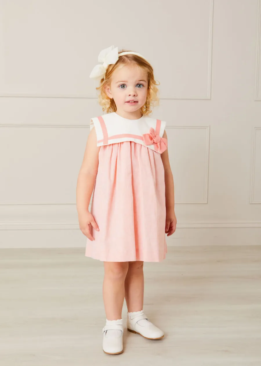 Pepa London Linen Blend Trapeze Dress in Peach Orange (12mths-10yrs) | Plain Cardigan in Cream (6mths-10yrs) | Big Bow Tulle Clip in Ivory | Openwork short socks White (0mths-8yrs) | Mary Jane Leather Baby Shoes in Ivory (20-24EU) | Flower Fairies of the Spring Book in White
