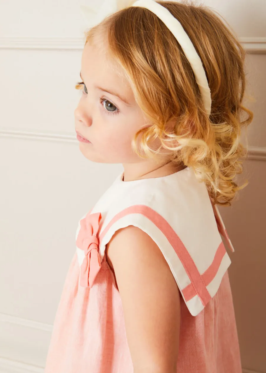 Pepa London Linen Blend Trapeze Dress in Peach Orange (12mths-10yrs) | Plain Cardigan in Cream (6mths-10yrs) | Big Bow Tulle Clip in Ivory | Openwork short socks White (0mths-8yrs) | Mary Jane Leather Baby Shoes in Ivory (20-24EU) | Flower Fairies of the Spring Book in White