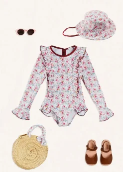 Pepa London Louisa Floral Ruffle Trim Long Sleeve Swimsuit in Pink (2-10yrs) | Louisa Floral Beach Hat in Pink (S-M) | Open Toe Leather Sandals in Brown (17-30EU) | Louisa Floral Detail Raffia Bag in Coral