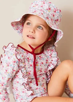 Pepa London Louisa Floral Ruffle Trim Long Sleeve Swimsuit in Pink (2-10yrs) | Louisa Floral Beach Hat in Pink (S-M) | Open Toe Leather Sandals in Brown (17-30EU) | Louisa Floral Detail Raffia Bag in Coral