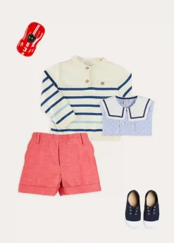 BOY Pepa London Lyall Stripe Anchor Motif Mariner Collar Short Sleeve Shirt in Blue (12mths-6yrs) | Striped Crewneck Button Detail Jumper in Blue (12mths-10yrs) | Plain Linen Toddler Shorts in Red (12mths-4yrs) | Canvas Plimsolls in Navy (20-35EU)