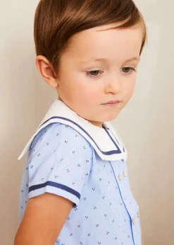 BOY Pepa London Lyall Stripe Anchor Motif Mariner Collar Short Sleeve Shirt in Blue (12mths-6yrs) | Striped Crewneck Button Detail Jumper in Blue (12mths-10yrs) | Plain Linen Toddler Shorts in Red (12mths-4yrs) | Canvas Plimsolls in Navy (20-35EU)
