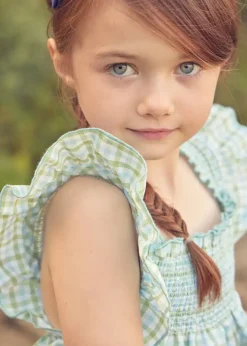 Pepa London Maxwell Gingham Smock Detail Blouse in Green (5-10yrs) | Maxwell Gingham Scallop Trim Embroidered Shorts in Green (18mths-10yrs) | Floral Openwork Cotton Cardigan in Green (2-10yrs) | Leather Woven Detail Sandals in Beige (24-35EU) | Navy Linen Big Bow Hairband | Flower Fairies of the Spring Book in White