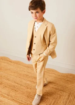 BOY Pepa London Plain Light Linen Blazer in Beige (4-10yrs) | Linen Mao Collar Long Sleeve Shirt in White (12mths-10yrs) | Plain Light Linen Vest in Beige (4-10yrs) | Linen Suit Trousers in Beige (4-10yrs) | Cream Boy's Belt | Suede Lace-up Espadrilles in Beige (24-35EU) | Ribbed Short Socks - Cream (0mths-10yrs)