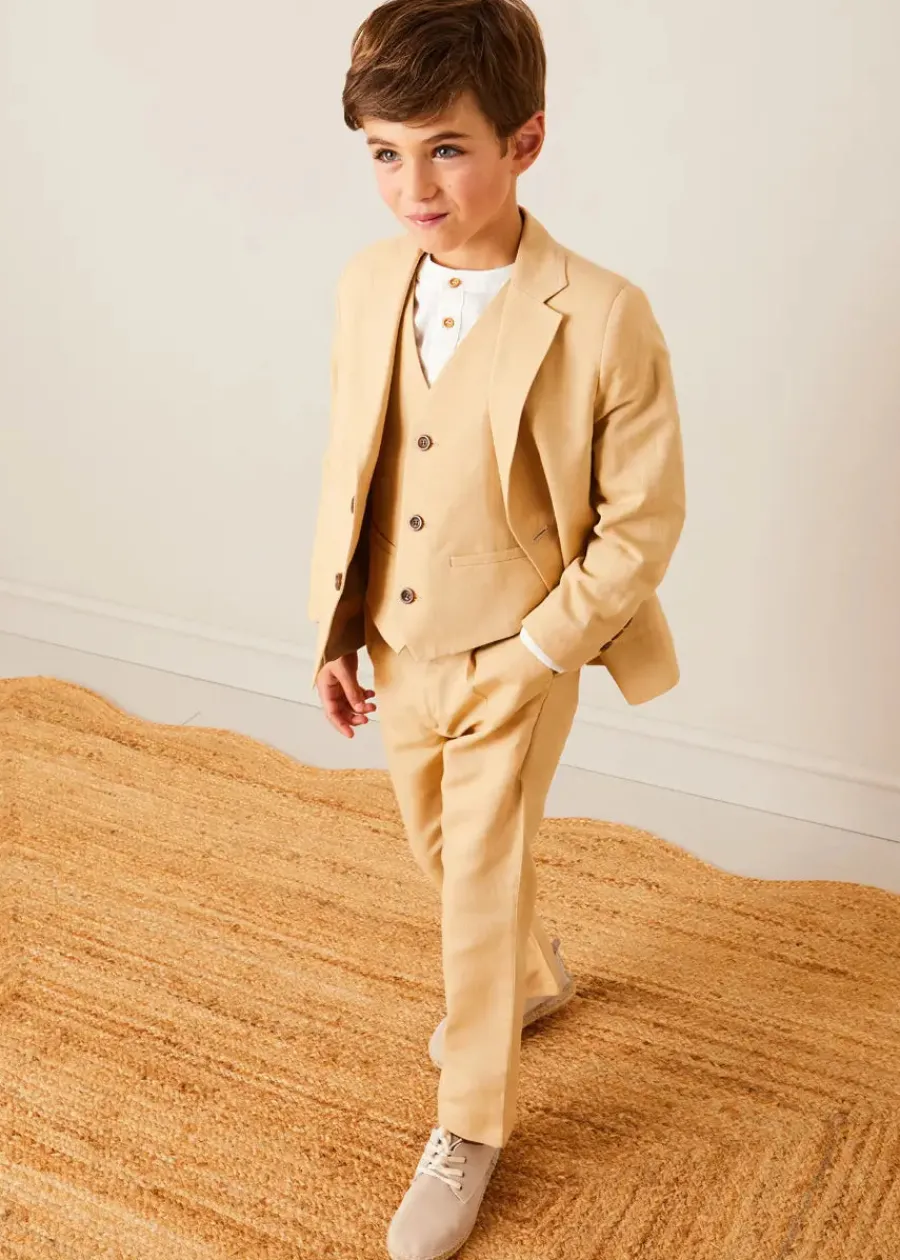 BOY Pepa London Plain Light Linen Blazer in Beige (4-10yrs) | Linen Mao Collar Long Sleeve Shirt in White (12mths-10yrs) | Plain Light Linen Vest in Beige (4-10yrs) | Linen Suit Trousers in Beige (4-10yrs) | Cream Boy's Belt | Suede Lace-up Espadrilles in Beige (24-35EU) | Ribbed Short Socks - Cream (0mths-10yrs)