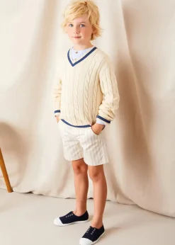 BOY Pepa London Plain Mao Collar Long Sleeve Shirt in Blue (4-10yrs) | Brompton Striped Shorts in Beige (4-10yrs) | Cable Knit V-Neck Jumper in Cream (4-10yrs) | Canvas Plimsolls in Navy (20-35EU) | Cream Boy's Belt