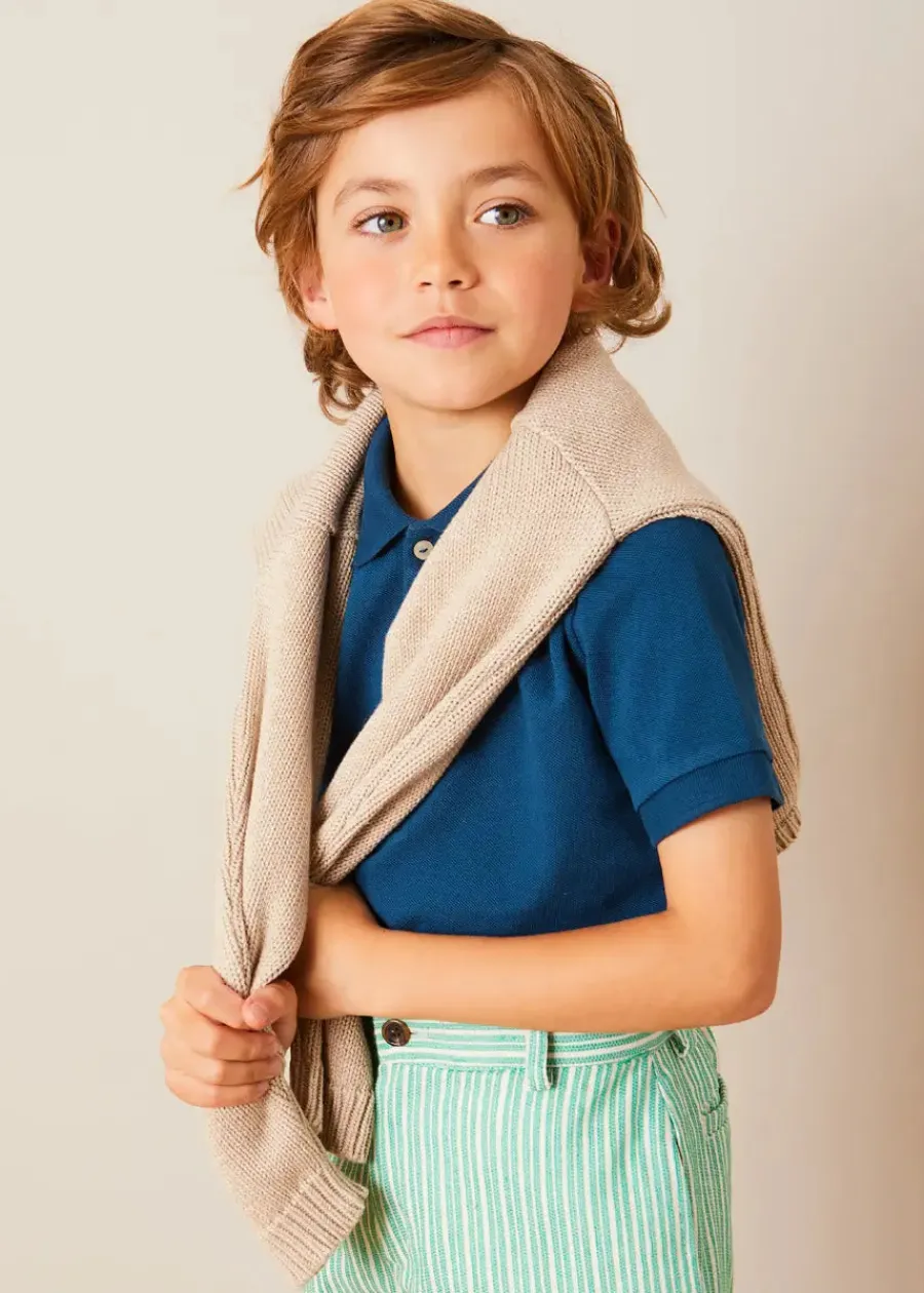 BOY Pepa London Plain Short Sleeve Polo Shirt in Navy (2-10yrs) | Cheyne Striped Pocket Detail Shorts in Green (4-10yrs) | Safari Button Detail Cardigan in Camel (4-10yrs) | Canvas Lace Up Plimsols in Green (23-35EU) | Peter Pan Book