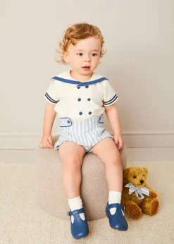 BOY Pepa London Regency Stripe Mariner Collar Two Piece Set With Bloomers in Blue (6mths-3yrs) | Plain Cardigan in Navy (6mths-10yrs) | Openwork Knitted Bonnet in Navy (S-L) | T-Bar Baby Shoes in Blue (20-26EU) | Cotton Short Socks Cream (0mths-10yrs) | Limited Edition Merrythought & Pepa Teddy Bear With Regency Striped Bow in Blue (S-L)