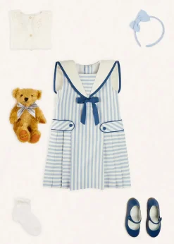 Pepa London Regency Striped Mariner Collar Pleated Sleeveless Dress in Blue (2-10yrs) | Openwork Cotton Cardigan in Cream (6mths-10yrs) | Limited Edition Merrythought & Pepa Teddy Bear With Regency Striped Bow in Blue (S-L) | Blue Linen Big Bow Hairband | Openwork short socks White (0mths-8yrs)
