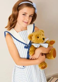 Pepa London Regency Striped Mariner Collar Pleated Sleeveless Dress in Blue (2-10yrs) | Openwork Cotton Cardigan in Cream (6mths-10yrs) | Limited Edition Merrythought & Pepa Teddy Bear With Regency Striped Bow in Blue (S-L) | Blue Linen Big Bow Hairband | Openwork short socks White (0mths-8yrs)