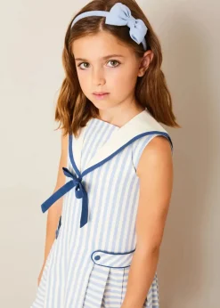 Pepa London Regency Striped Mariner Collar Pleated Sleeveless Dress in Blue (2-10yrs) | Openwork Cotton Cardigan in Cream (6mths-10yrs) | Limited Edition Merrythought & Pepa Teddy Bear With Regency Striped Bow in Blue (S-L) | Blue Linen Big Bow Hairband | Openwork short socks White (0mths-8yrs)