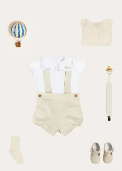 BOY Pepa London Train Embroidery Statement Collar Short Sleeve Bodysuit in Green (3mths-2yrs) | Plain Bloomers With Braces in White (6mths-2yrs) | Plain Cardigan in Cream (6mths-10yrs) | Suede T-Bar Pram Shoes in Beige (17-20EU) | Ribbed Short Socks in Beige (0mths-10yrs) | Big Brother Beach Mouse Toy | Waterford Striped Dummy Clip in Beige | BIBS Dummy in Ivory