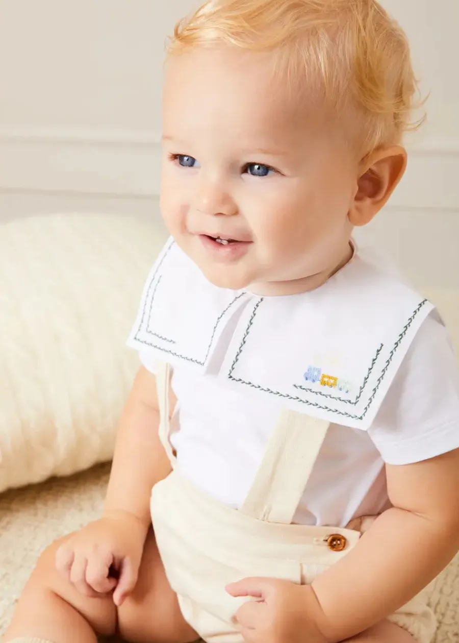 BOY Pepa London Train Embroidery Statement Collar Short Sleeve Bodysuit in Green (3mths-2yrs) | Plain Bloomers With Braces in White (6mths-2yrs) | Plain Cardigan in Cream (6mths-10yrs) | Suede T-Bar Pram Shoes in Beige (17-20EU) | Ribbed Short Socks in Beige (0mths-10yrs) | Big Brother Beach Mouse Toy | Waterford Striped Dummy Clip in Beige | BIBS Dummy in Ivory
