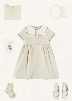 Pepa London Waterford Striped Mariner Collar Double Breasted Short Sleeve Dress in Beige (12mths-10yrs) | Openwork Cotton Cardigan in Cream (6mths-10yrs) | Girl's Beige Leather Celebration Shoes (20-34EU) | Tulle Long Bow Clip In Cream | Cotton Short Socks Cream (0mths-10yrs)